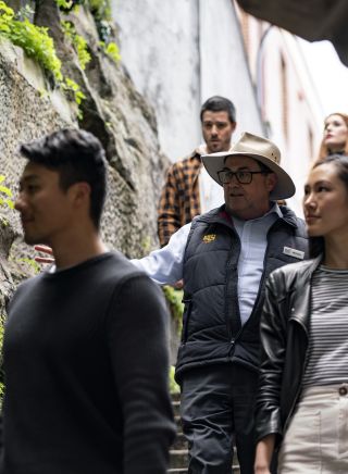 Group enjoying a historical tour of The Rocks with The Rocks Walking Tour company in Sydney