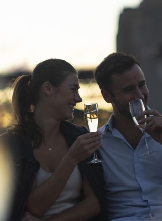 Couple enjoying romantic time at Sydney Opera Bar