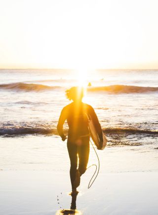 Surfing at Sunrise - Whale Beach - Sydney's Northern Beaches