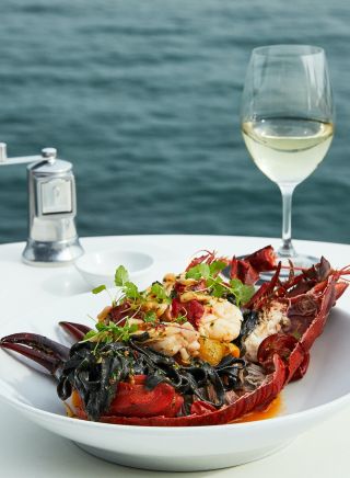 Lobster with house made squid ink spaghetti at Catalina Rose Bay, Sydney East