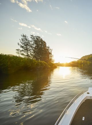 Man enjoying an afternoon of fishing on the Hawkesbury River, Wisemans Ferry