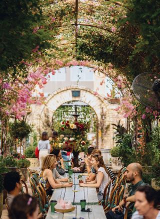 People enjoying food and wine at The Grounds of Alexandria, Sydney