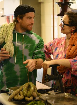 Hayden making sausage with Chrissy Flanagan from The Sausage Factory