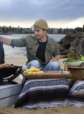 Hayden cooking Jerk Chicken with Grilled Corn Salsa at Manly, Sydney North