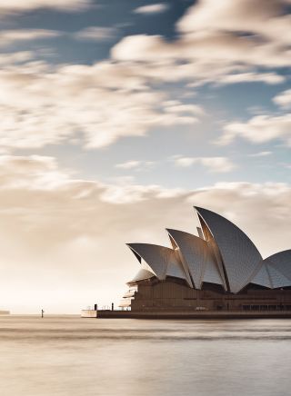 Morning sun rising over the Sydney Opera House, Sydney