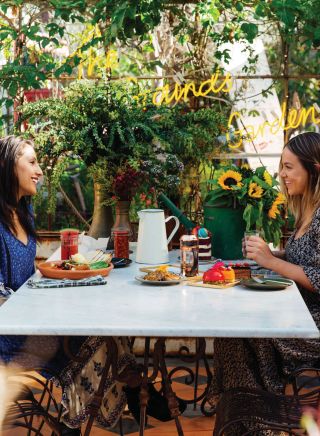 Friends enjoying breakfast at The Grounds of Alexandria, Sydney