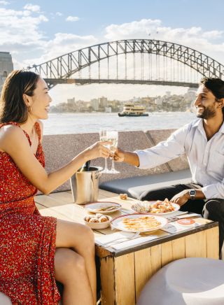 Couple enjoying the view at Opera Bar, Sydney Harbour