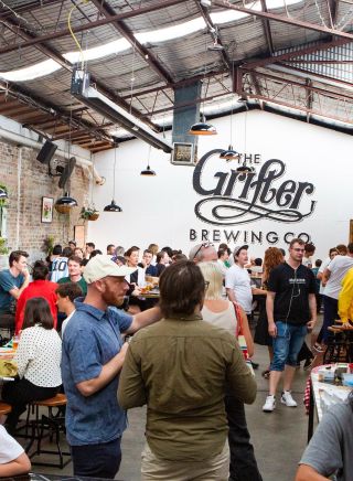 People enjoying a beer at Grifter Brewing Co, Marrickville