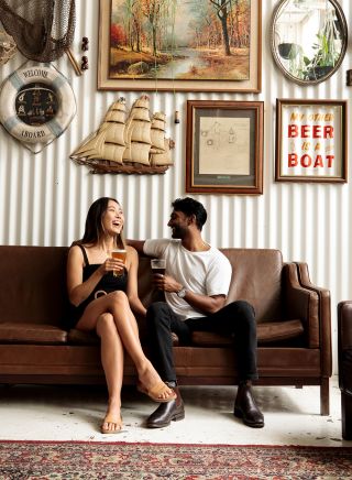 Couple enjoying beers at Willie The Boatman, St. Peters