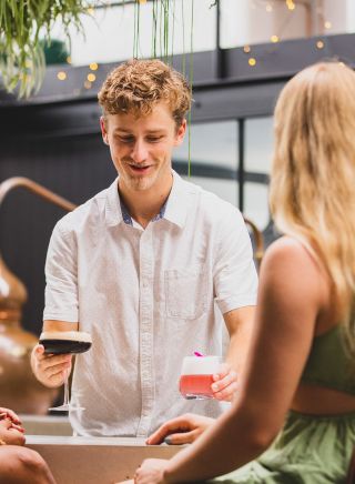 Friends enjoying cocktails, Seadrift Distillery, Brookvale