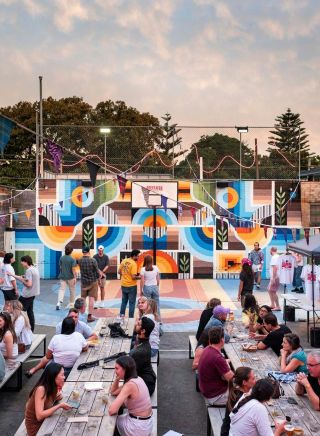 Groups enjoying outdoor dining at Vic on the Park in Marrickville