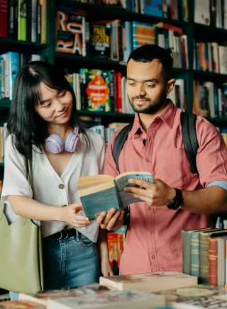 Young people browsing through the books, Elizabeth's Bookshop, Newtown