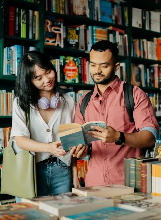 Young people browsing through the books, Elizabeth's Bookshop, Newtown