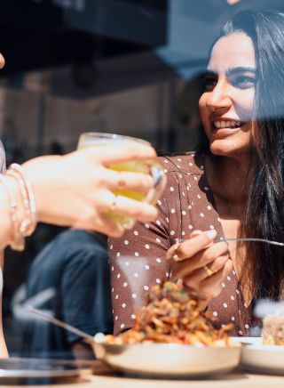Friends enjoying food and drink, Cairo Takeaway, Newtown