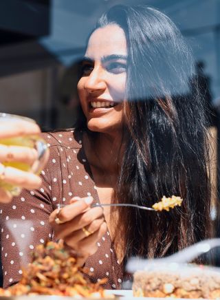 Friends enjoying food and drink, Cairo Takeaway, Newtown