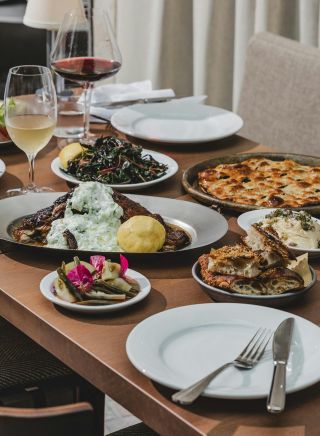 Table of dishes, Olympus Dining, Surry Hills - Credit: Nikki To
