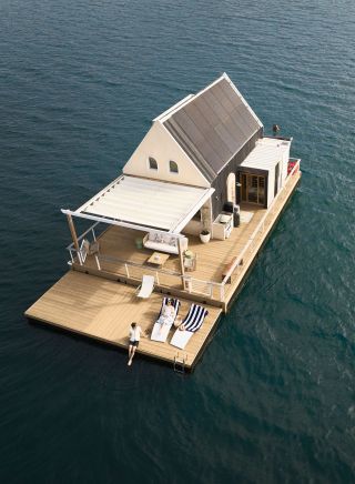 Couple lounging on the dock of the Lilypad, Lilypad, Palm Beach