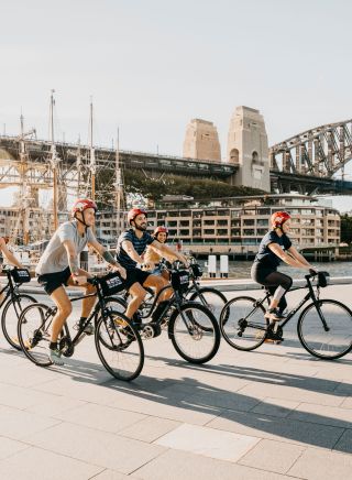 Small group enjoying a ride around Sydney Harbour with Bonza Bike Tours, The Rocks