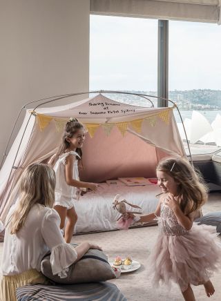 Mother wth children playing with tent, Four Season Hotel, Sydney - Credit: Kenseet