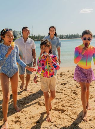 Family eating icecream at beach, Fairy Bower, Manly