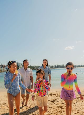 Family eating icecream at beach, Fairy Bower, Manly