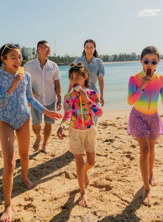 Family eating icecream at beach, Shelly Beach, Manly