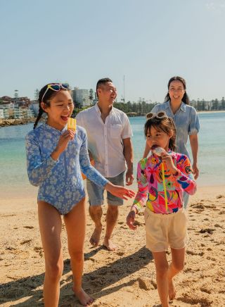 Family eating icecream at beach, Shelly Beach, Manly