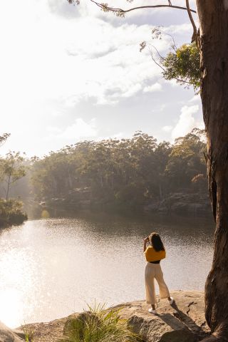 Woman enjoying a walk along the banks of the Parramatta River, Parramatta