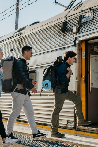 Young people catching a train at Katoomba train station, Blue Mountains