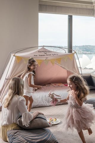 Mother wth children playing with tent, Four Season Hotel, Sydney - Credit: Kenseet