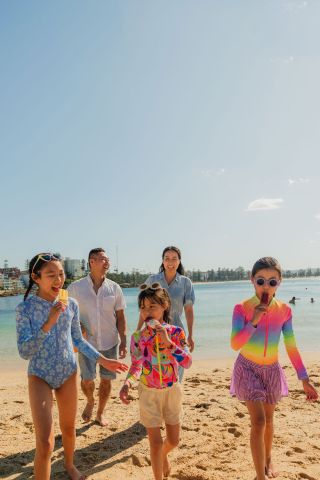 Family eating icecream at beach, Fairy Bower, Manly