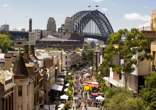 Markets set up in The Rocks against the backdrop of the Harbour Bridge, Sydney