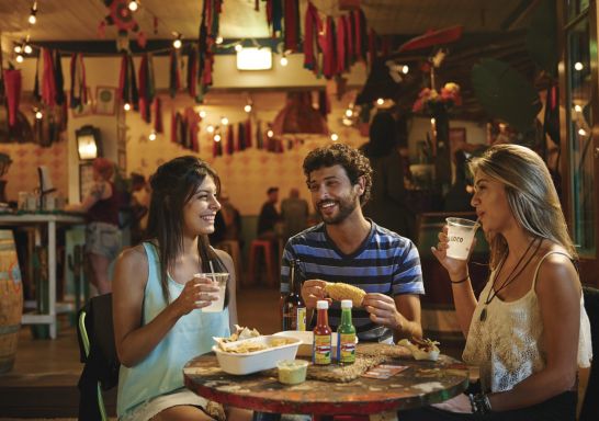 Students enjoying food and drink at El Loco in Surry Hills