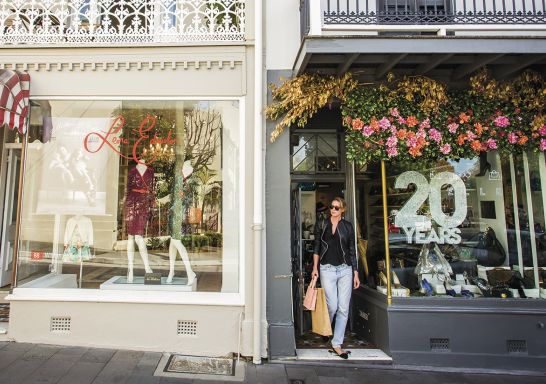 Woman shopping at Pelle Designer Recycled store, William Street in Paddington