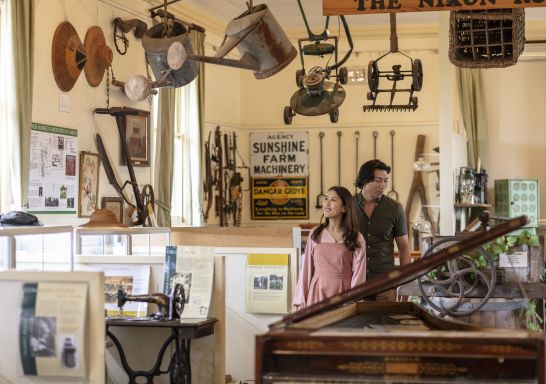 Couple learning about the cultural and heritage background of Camden at the Camden Museum in Sydney's west