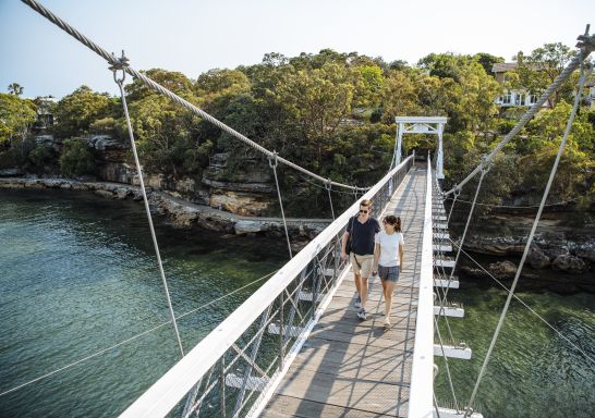 Couple enjoying a scenic walk around Parsley Bay, Vaucluse 