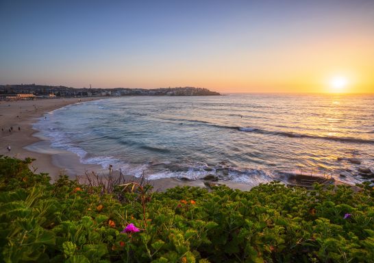 Morning sun rising over Bondi Beach, Sydney