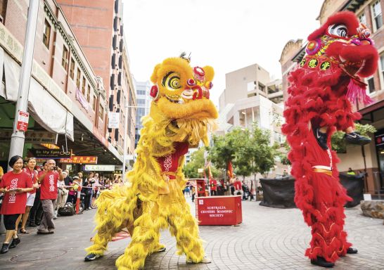 Dragon and lion dancer performing in Chinatown during Chinese New Year 2018, Haymarket