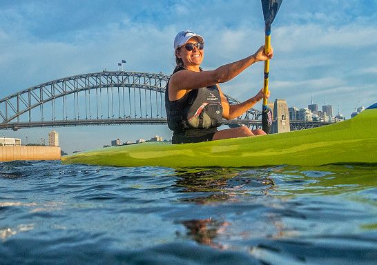 Kayakers enjoying Sydney Harbour near the Sydney Opera House with the Sydney Harbour Bridge in the background, Sydney Harbour