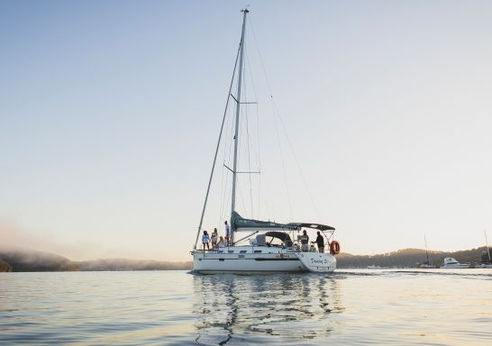 Group enjoying yacht charter experience with Allsail Sailing Club and Pittwater Yacht Charter on Pittwater, Church Point