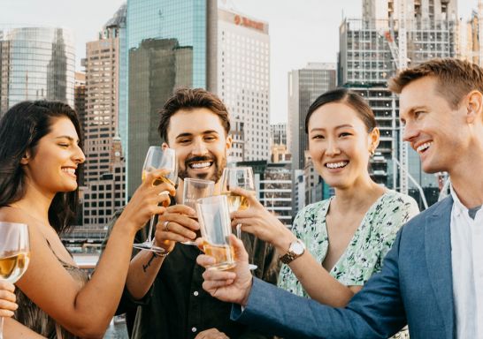 Friends enjoying drinks at The Rocks, Sydney