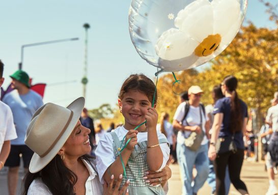 Mum and daughter enjoy balloons, Sydney Royal Easter Show, Homebush 