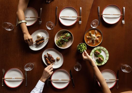 Sharing delicious meals - Aerial view of dishes with hands, Luc-San Restaurant, Potts Point