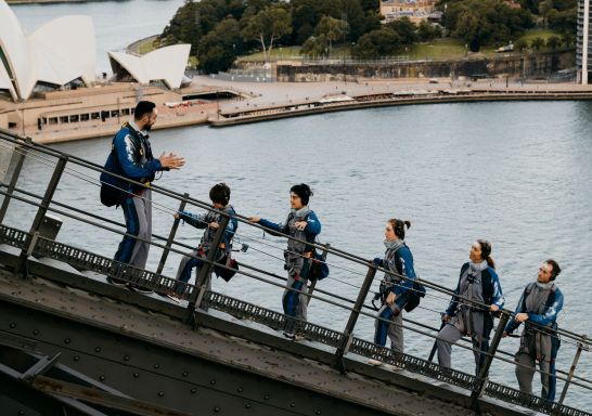 Family enjoying the Burrawa Indigenous Experience, BridgeClimb, Sydney CBD